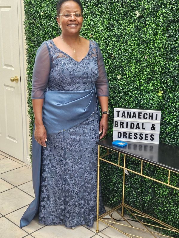 Bridal gowns displayed in boutique showroom