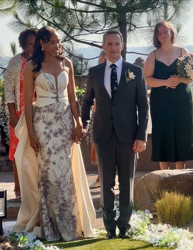 Measuring a wedding dress with tape measure